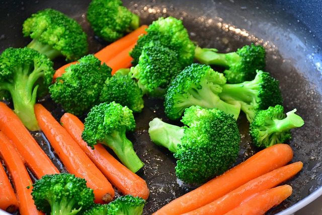 Can Boxer Dogs Eat Vegetables? Phot of carrots and Broccoli