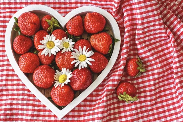 Dog food with fiber - photo of strawberries forming a heart showing heart health benefits of fiber